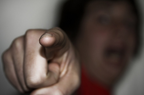 A Pointed Finger Pointed With Blurry Background